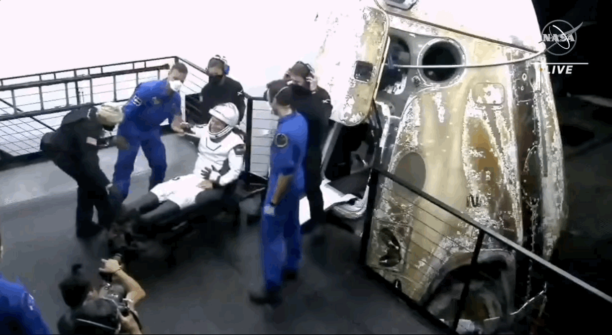ESA astronaut Matthias Maurer waves and gives the thumbs up aboard SpaceX recovery boat Shannon