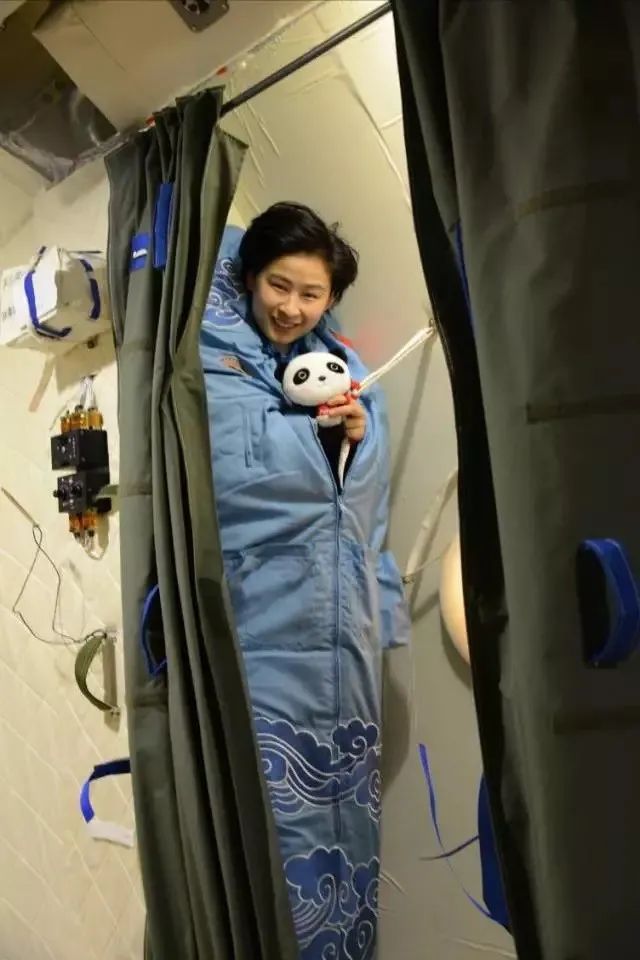 Astronaut sleeping in sleeping bag